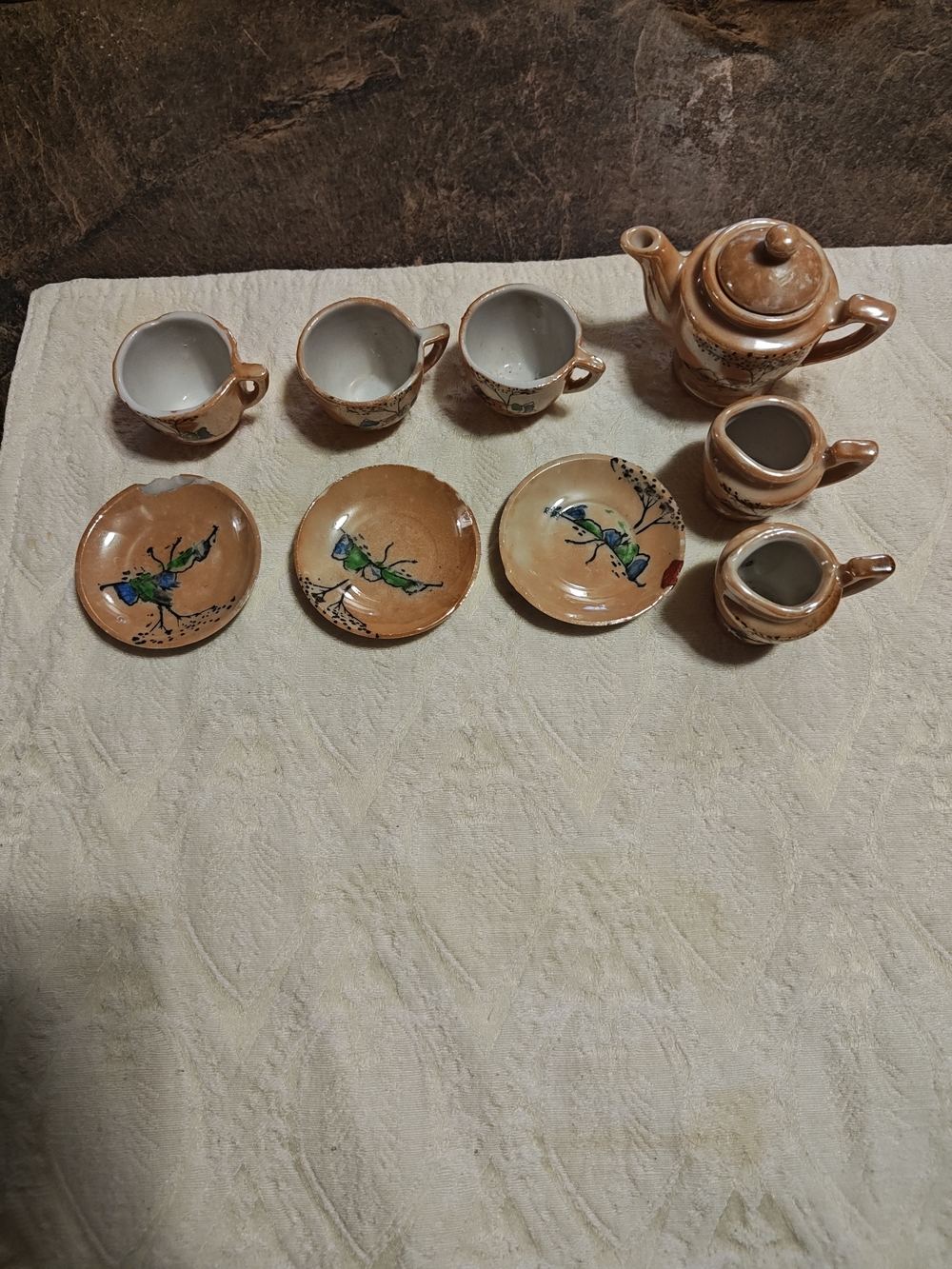 Brown Ceramic Tea Set with Hand-Painted Green Floral Motif